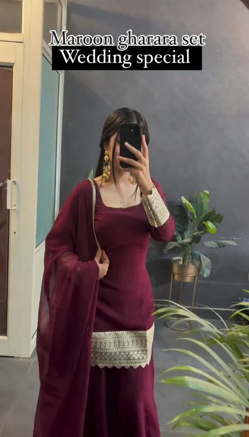 Erva's Off Maroon Designer Readymade Gown Suit Set .